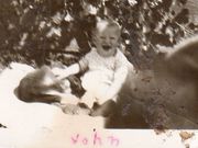 Baby loves the doggie!