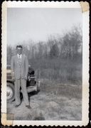 John with his big black Packard